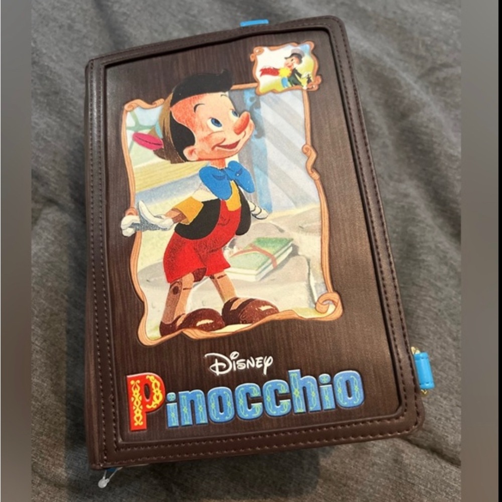 Disney Pinocchio Book Loungefly Crossbody or backpack NWT
